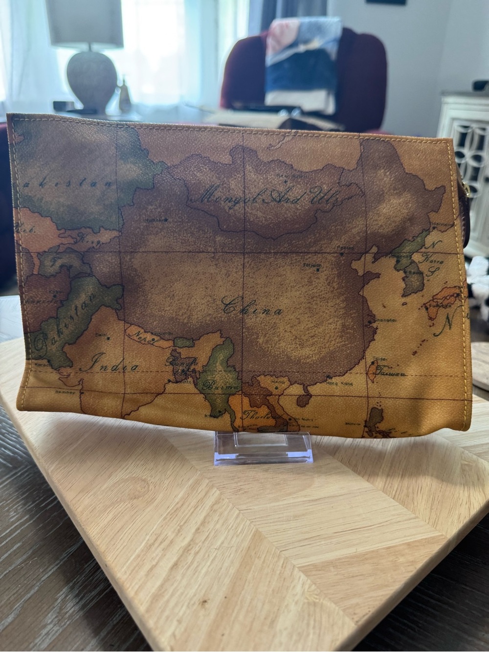 Alviero Martini Prima Classe pouch bag, featuring a distinct, vintage-style map!
